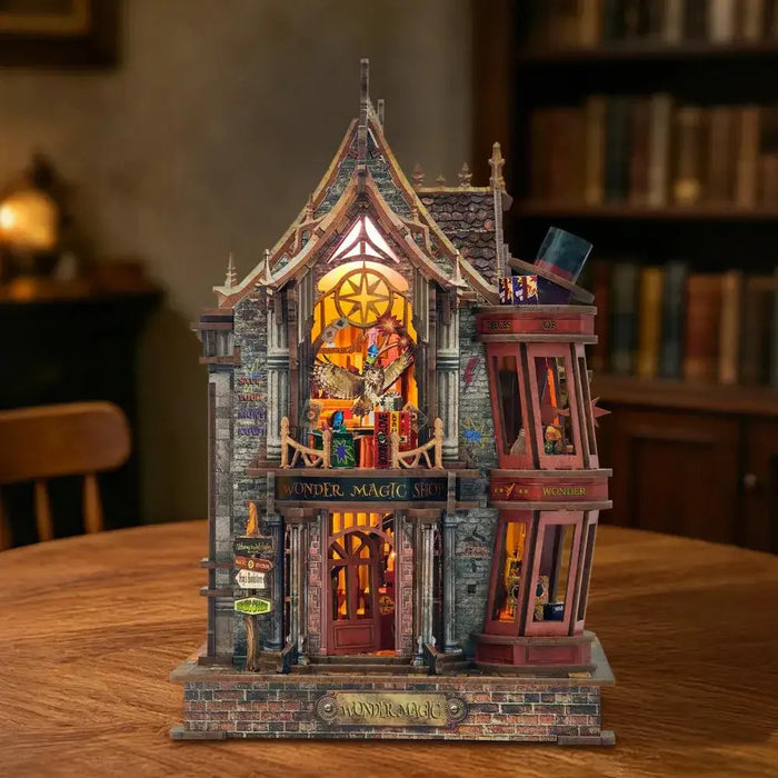 Magic Wonder House miniature shop with a pointed roof, colored upper window and red side bay.