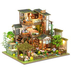 Bamboo Spring Courtyard miniature house against a white background.