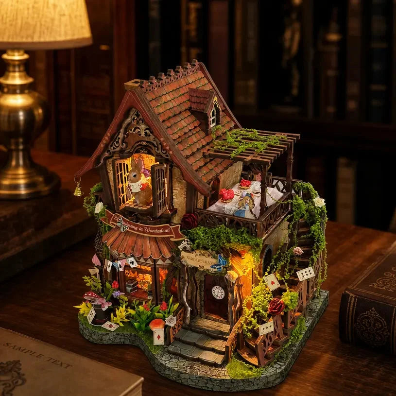 Angled Dreamy Cottage showing its tiled roof, upper terrace and rose-lined steps.
