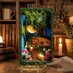 Hobbins Hovel displayed on a desk with a finger at the front touch-lighting switch.