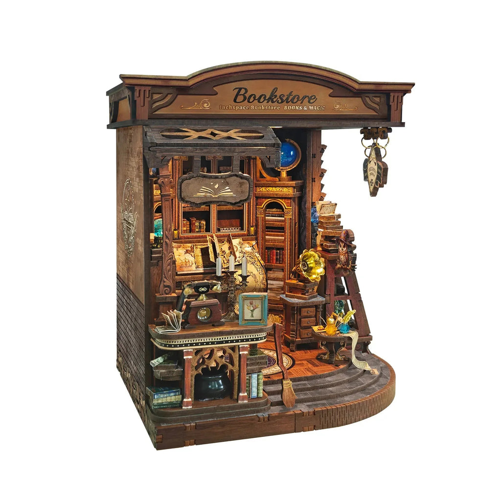 Left-side view of Inchspace Bookstore showing the miniature counter and book-lined wall.