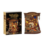 Inchspace Bookstore miniature room beside its illustrated kit box.