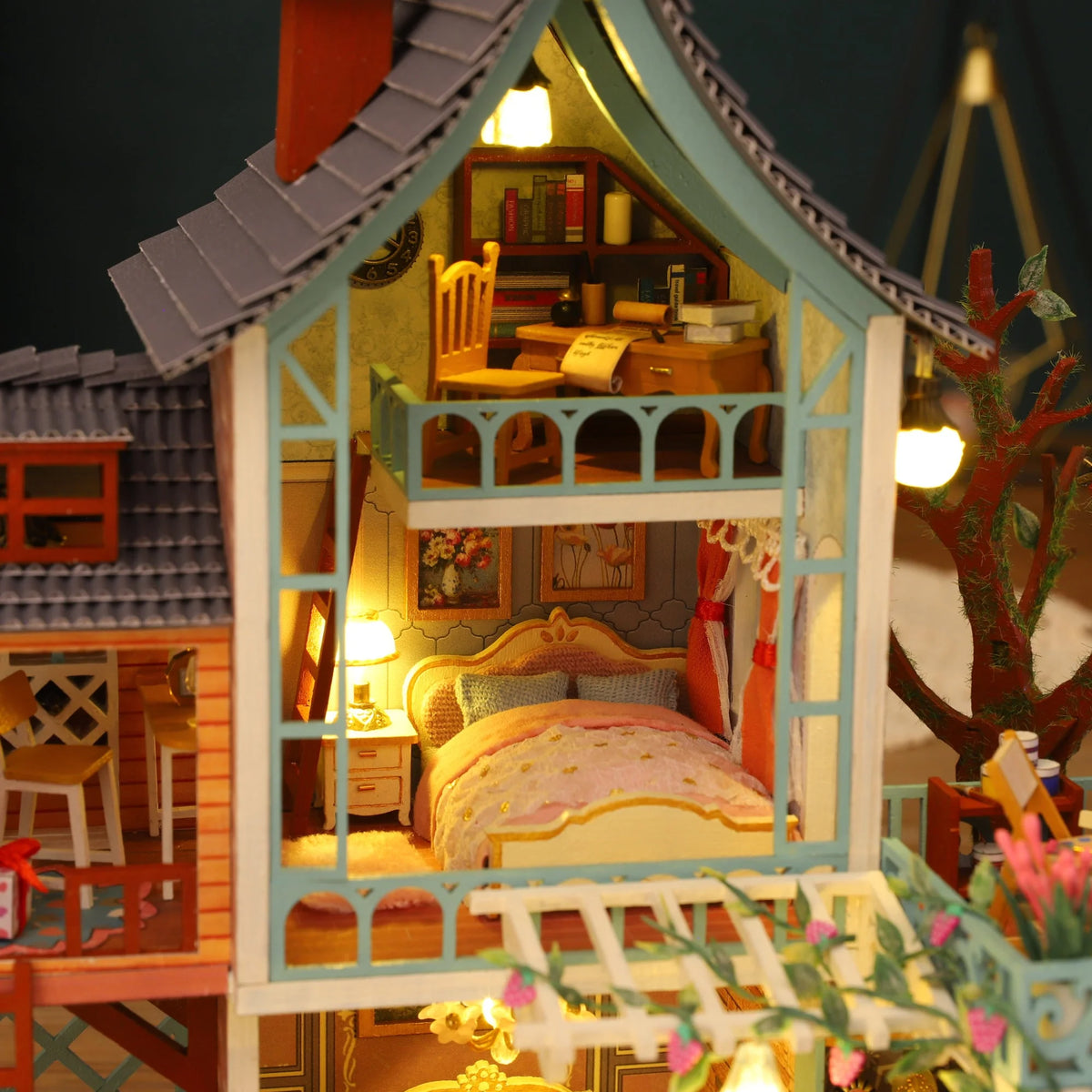 Jungle Secret upper bedroom beneath a steep roof with books on the attic shelf.