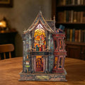 Magic Wonder House miniature shop with a pointed roof, colored upper window and red side bay.