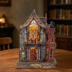 Magic Wonder House miniature shop with a pointed roof, colored upper window and red side bay.
