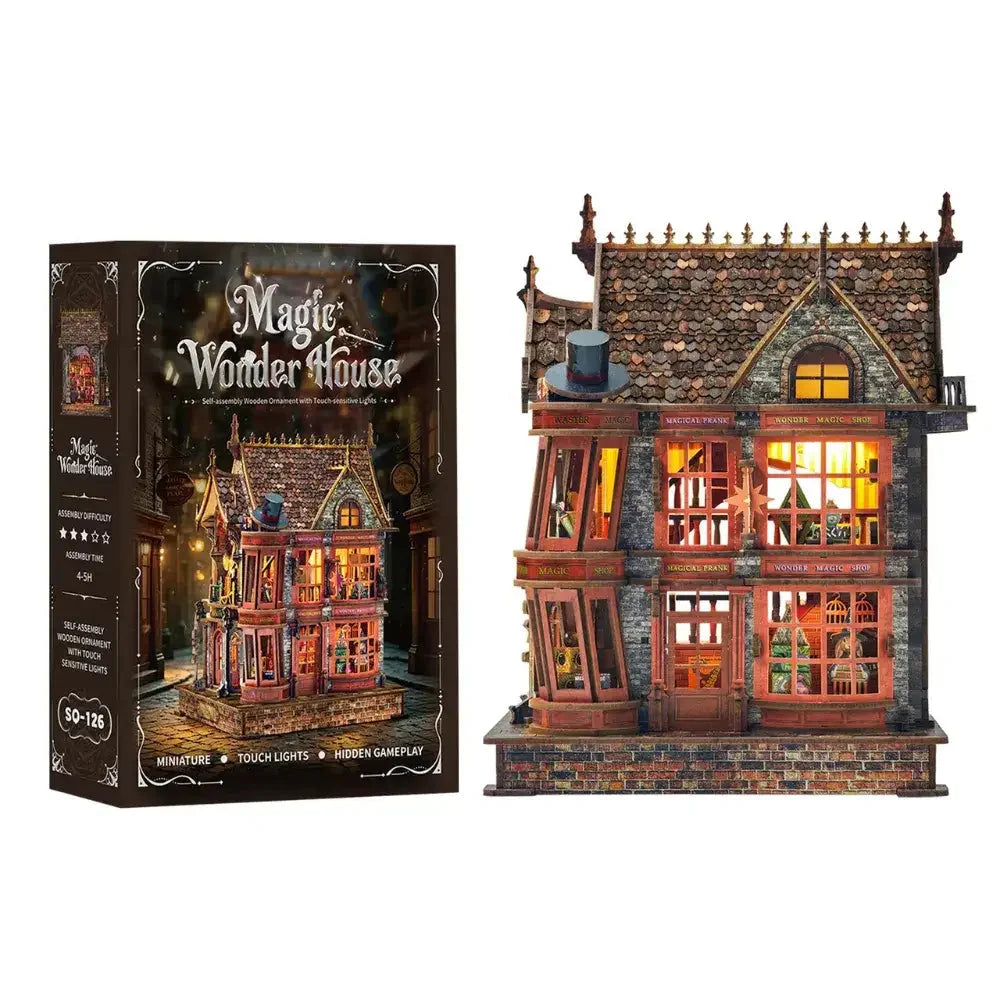 Magic Wonder House model beside its illustrated kit box.
