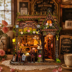 Mocha Diary miniature café beside a coffee cup, flowers and a chalkboard sign.