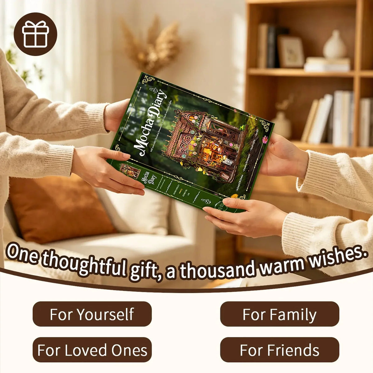 Hands exchanging a Mocha Diary kit box.