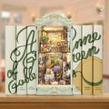 Pastoral book nook between books, showing a cottage interior with a balcony and floral furniture.
