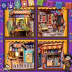 Plaza de los Muertos details showing festive shopfronts, flowers and skeleton musicians.