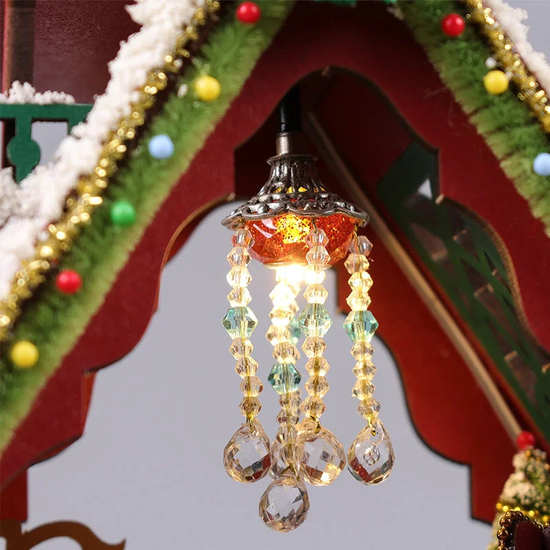 Close-up of a glowing chandelier beneath the Snowy Christmas Lodge roof.