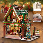 Snowy Christmas Lodge with close-ups of the music mechanism and touch switch.
