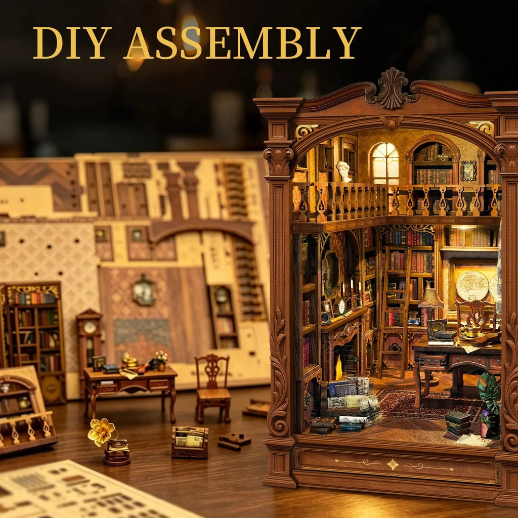 Vintage Archive book nook beside printed component sheets and miniature assembly pieces.